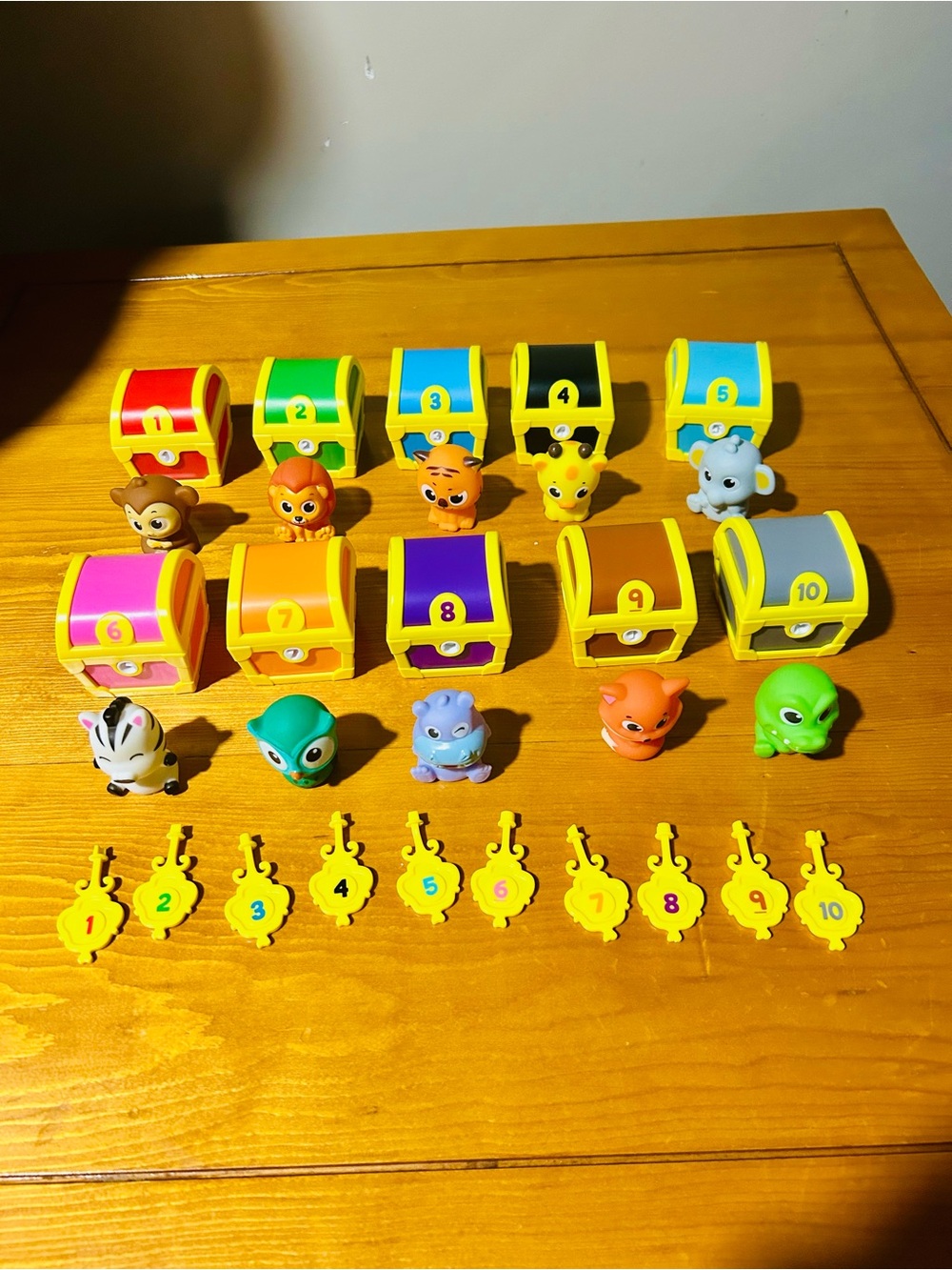 Colorful Numbered Treasure Chests with keys and Animal Figures